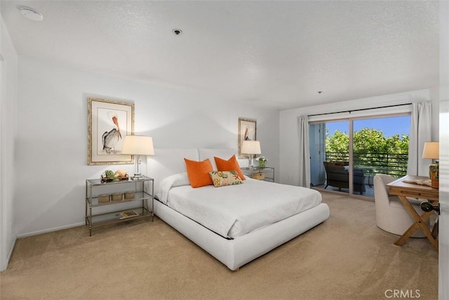 260 Cagney Ln Unit 206, Newport Beach, CA 92663 - bedroom featuring access to exterior and light colored carpet
