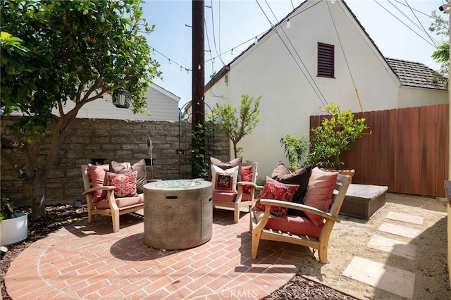 413 W Santa Clara Ave, Santa Ana, CA 92706 - fenced backyard with a patio area and outdoor lounge area