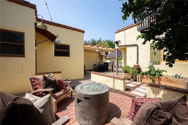 413 W Santa Clara Ave, Santa Ana, CA 92706 - view of patio featuring an outdoor living space with a fire pit and a pergola