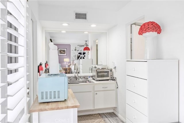 2455 Via Sonoma Unit A, Palm Springs, CA 92264 - bathroom with vanity and recessed lighting