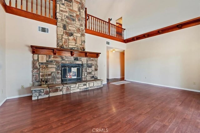 29801 Maxine Ln, Menifee, CA 92584 - unfurnished living room featuring a towering ceiling, wood finished floors, and a fireplace
