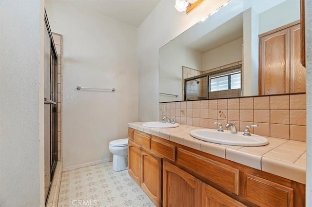 29801 Maxine Ln, Menifee, CA 92584 - full bathroom featuring a shower stall, double vanity, tasteful backsplash, and tile patterned floors