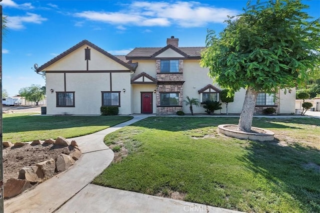 29801 Maxine Ln, Menifee, CA 92584 - tudor home featuring stucco siding, a front lawn, a chimney, and stone siding