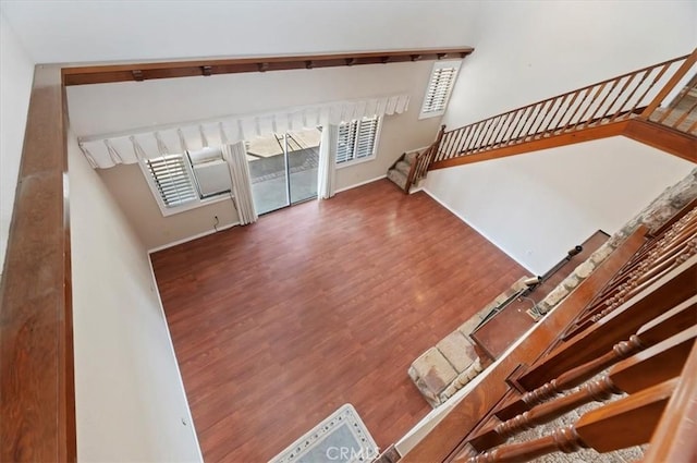 29801 Maxine Ln, Menifee, CA 92584 - unfurnished living room featuring wood finished floors and stairway