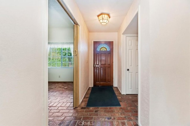 29801 Maxine Ln, Menifee, CA 92584 - foyer with brick floors and a textured wall
