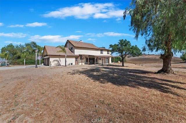 29801 Maxine Ln, Menifee, CA 92584 - back of house featuring stucco siding