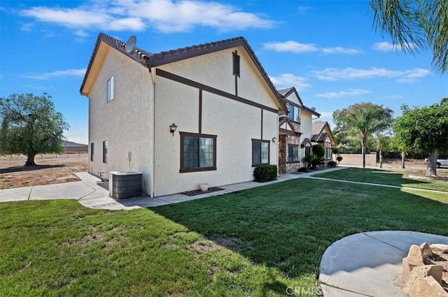 29801 Maxine Ln, Menifee, CA 92584 - view of side of property featuring a lawn and stucco siding