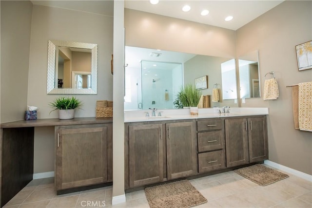 11534 Alana Ln, Beaumont, CA 92223 - full bathroom featuring double vanity, an enclosed shower, and tile patterned flooring