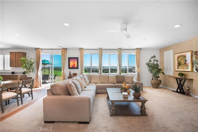11534 Alana Ln, Beaumont, CA 92223 - living room featuring recessed lighting, a ceiling fan, and light carpet