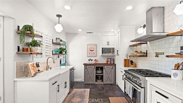 3209 Bennett Dr, Los Angeles, CA 90068 - kitchen featuring open shelves, appliances with stainless steel finishes, range hood, light countertops, and recessed lighting