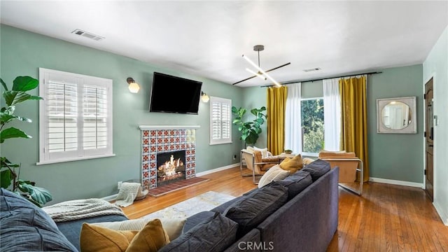 3209 Bennett Dr, Los Angeles, CA 90068 - living room featuring hardwood / wood-style flooring and a brick fireplace
