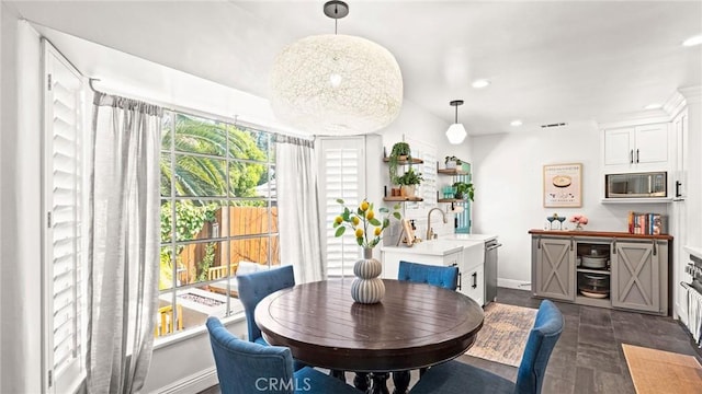 3209 Bennett Dr, Los Angeles, CA 90068 - dining room with recessed lighting and dark wood finished floors