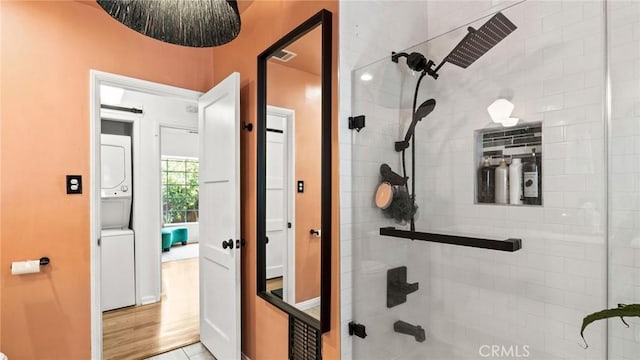 3209 Bennett Dr, Los Angeles, CA 90068 - full bathroom featuring stacked washing machine and dryer
