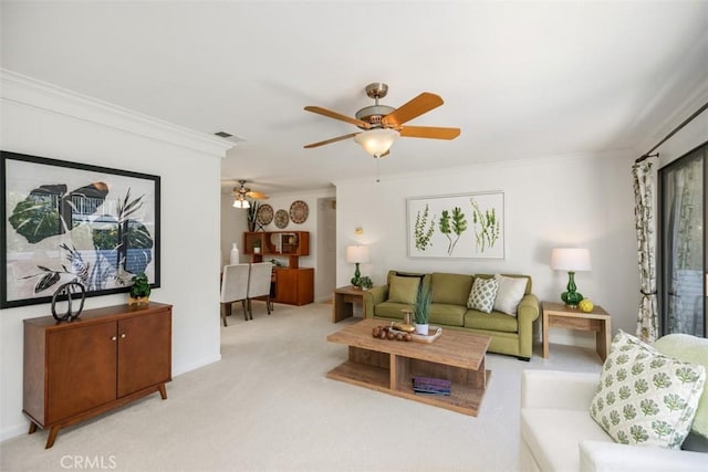 933 Avenida Majorca Unit P, Laguna Woods, CA 92637 - living area with crown molding, ceiling fan, and light carpet