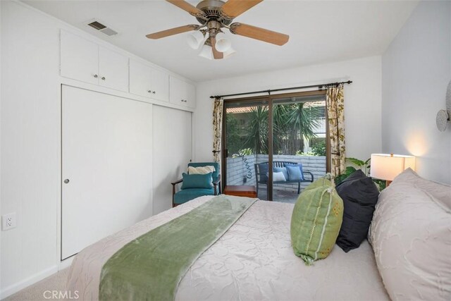 933 Avenida Majorca Unit P, Laguna Woods, CA 92637 - bedroom with access to outside, a closet, a ceiling fan, and carpet