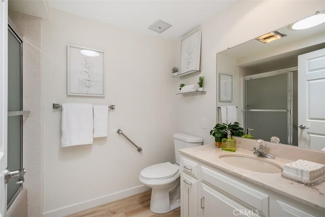 933 Avenida Majorca Unit P, Laguna Woods, CA 92637 - full bathroom featuring vanity and wood finished floors