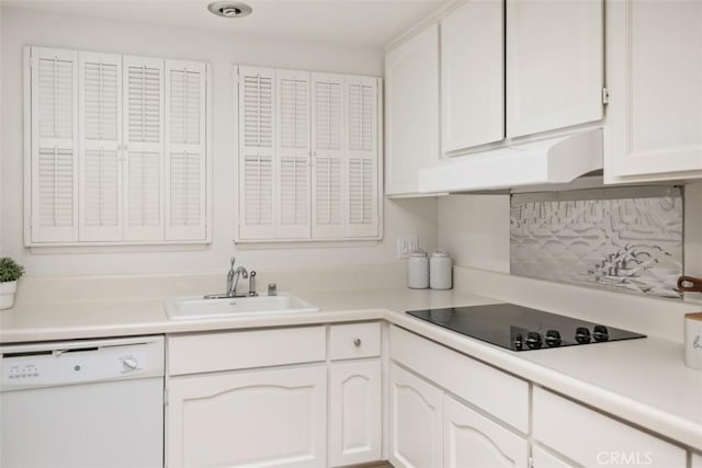 933 Avenida Majorca Unit P, Laguna Woods, CA 92637 - kitchen with dishwasher, black electric stovetop, white cabinets, under cabinet range hood, and light countertops