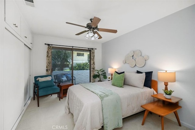 933 Avenida Majorca Unit P, Laguna Woods, CA 92637 - bedroom with access to exterior, light carpet, a closet, and ceiling fan