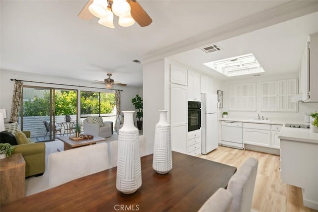 933 Avenida Majorca Unit P, Laguna Woods, CA 92637 - dining area featuring ceiling fan and light wood finished floors