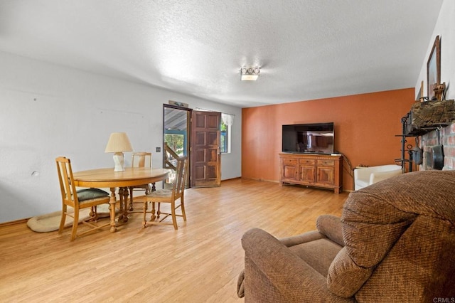 5041 Pine Ridge Ave, Julian, CA 92036 - living room featuring light wood-style floors and a textured ceiling