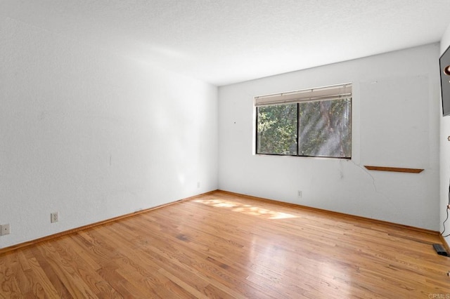 5041 Pine Ridge Ave, Julian, CA 92036 - empty room featuring wood finished floors and baseboards