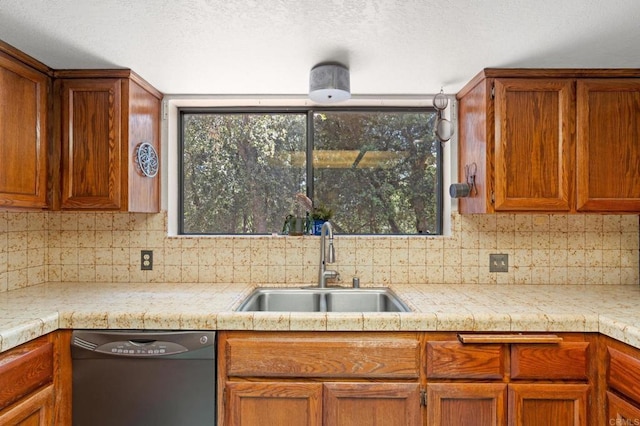 5041 Pine Ridge Ave, Julian, CA 92036 - kitchen featuring dishwasher, backsplash, healthy amount of natural light, brown cabinetry, and a textured ceiling