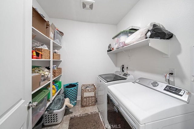 30701 Noble Ct, Homeland, CA 92548 - laundry room with washing machine and dryer