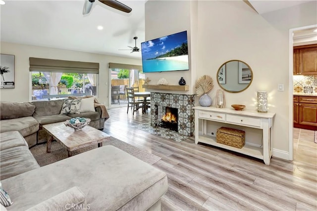 33081 Regatta Ct, San Juan Capistrano, CA 92675 - living area featuring a ceiling fan, light wood finished floors, recessed lighting, and a stone fireplace