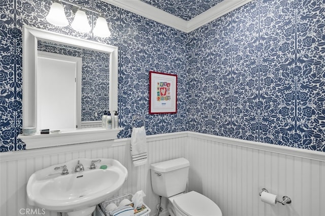 21761 Tahoe Ln, Lake Forest, CA 92630 - bathroom featuring a wainscoted wall, wallpapered walls, and crown molding