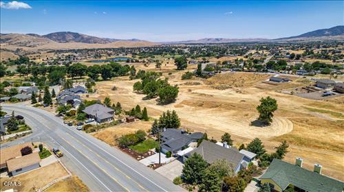 22820 Mariposa Rd, Tehachapi, CA 93561 - drone / aerial view of a mountainous background