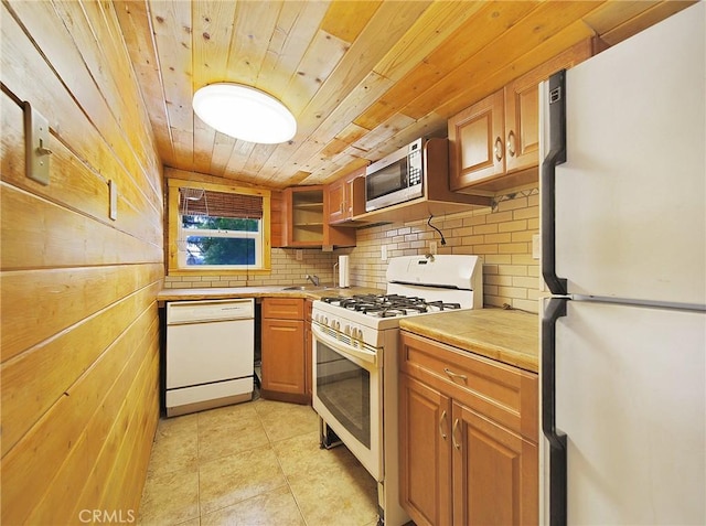 22052 Elliot Rd, Cedarpines Park, CA 92322 - kitchen featuring white appliances, wood ceiling, light countertops, decorative backsplash, and light tile patterned flooring