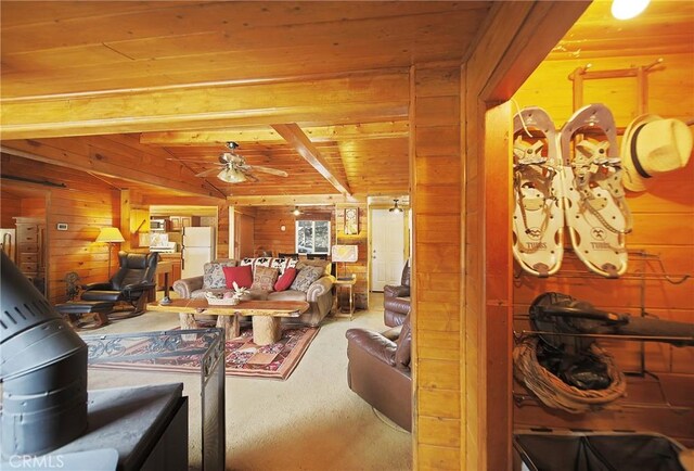 22052 Elliot Rd, Cedarpines Park, CA 92322 - carpeted living area with wood walls, a ceiling fan, and wood ceiling