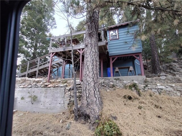 22052 Elliot Rd, Cedarpines Park, CA 92322 - rear view of property featuring stairs and a deck