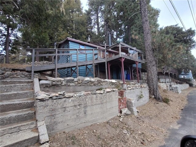 22052 Elliot Rd, Cedarpines Park, CA 92322 - rear view of house with a deck