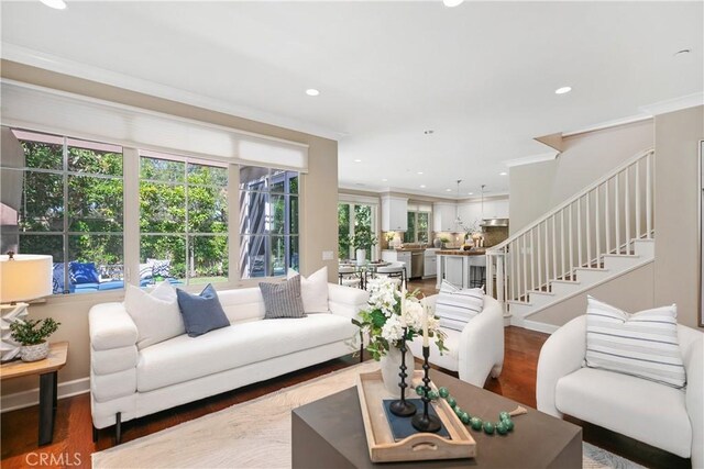 32 Tesoro, Irvine, CA 92618 - living area with ornamental molding, recessed lighting, wood finished floors, and stairs