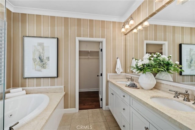 32 Tesoro, Irvine, CA 92618 - full bath featuring double vanity, crown molding, a tub with jets, and a walk in closet