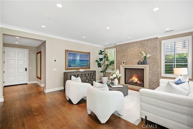 32 Tesoro, Irvine, CA 92618 - living room with recessed lighting, wood finished floors, a fireplace, and crown molding
