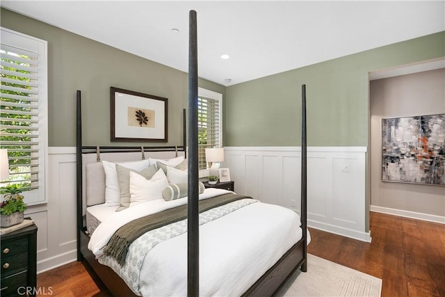 32 Tesoro, Irvine, CA 92618 - bedroom featuring wainscoting, wood finished floors, and a decorative wall