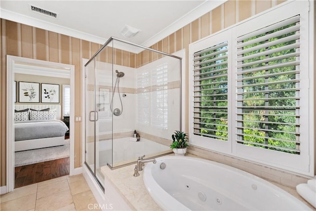 32 Tesoro, Irvine, CA 92618 - bathroom with a stall shower, a tub with jets, connected bathroom, tile patterned flooring, and ornamental molding
