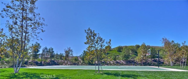 32 Tesoro, Irvine, CA 92618 - view of sport court with community basketball court and a lawn