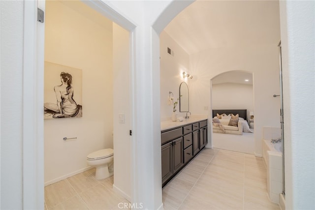2455 Mcmackin Dr, Corona, CA 92881 - bathroom featuring double vanity, tile patterned floors, and a bath