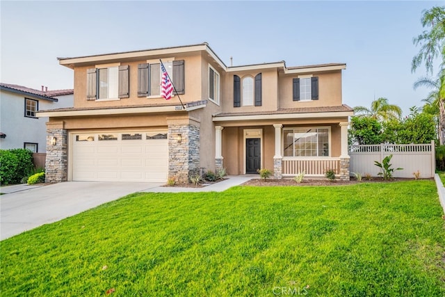 2455 Mcmackin Dr, Corona, CA 92881 - view of front facade featuring stucco siding, a garage, a porch, and stone siding