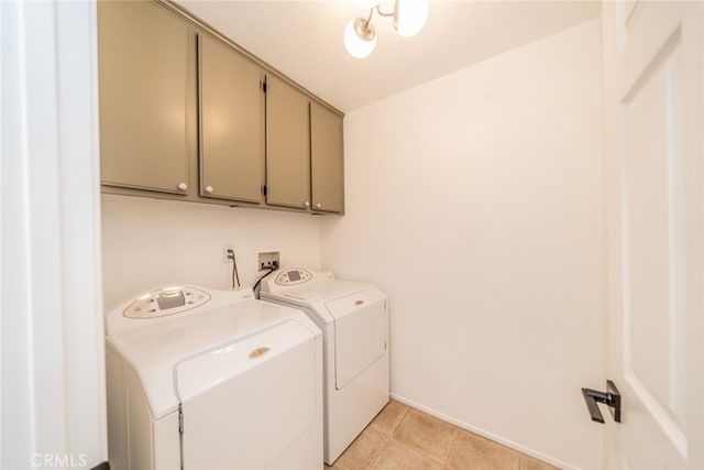 2455 Mcmackin Dr, Corona, CA 92881 - laundry room featuring washer and dryer, cabinet space, and light tile patterned flooring