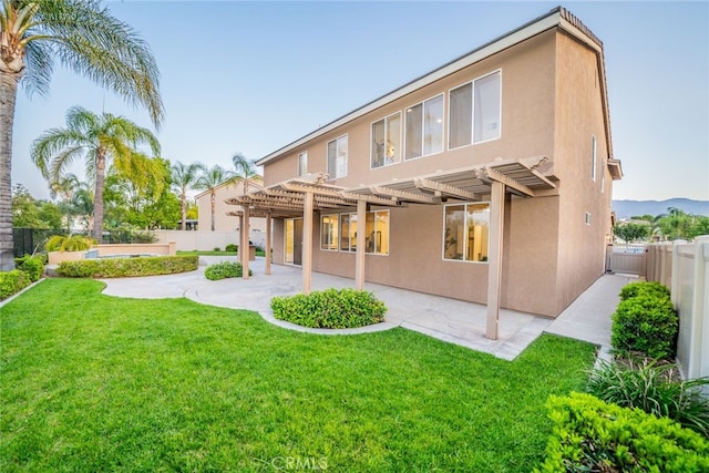 2455 Mcmackin Dr, Corona, CA 92881 - back of house featuring a pergola, stucco siding, a fenced backyard, and a patio area