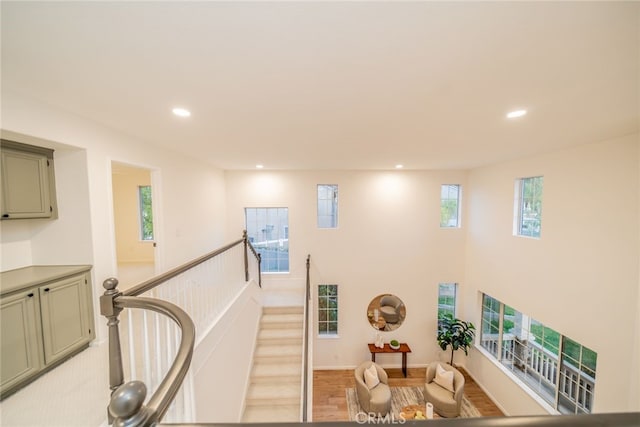 2455 Mcmackin Dr, Corona, CA 92881 - staircase with recessed lighting and wood finished floors