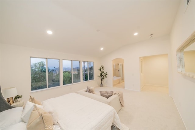 2455 Mcmackin Dr, Corona, CA 92881 - bedroom with recessed lighting, arched walkways, vaulted ceiling, light colored carpet, and connected bathroom