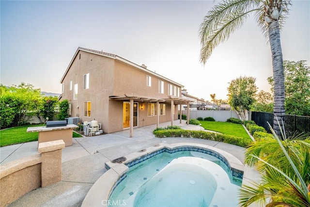 2455 Mcmackin Dr, Corona, CA 92881 - view of pool featuring a fenced backyard, a jacuzzi, and a patio
