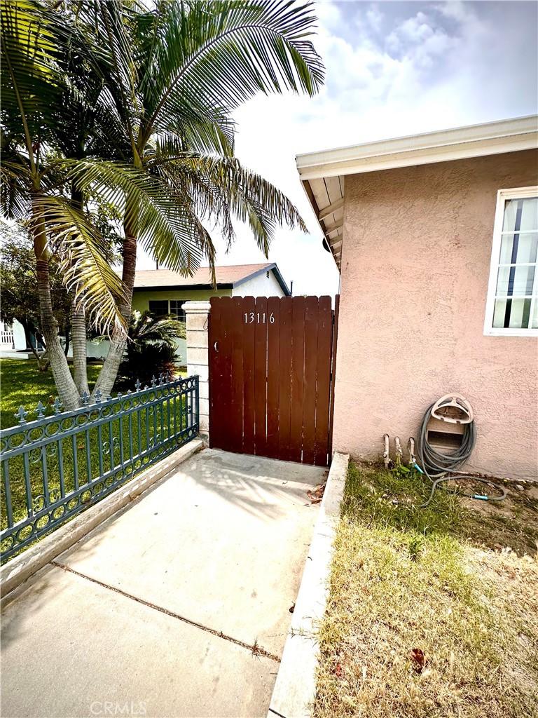 13118 Beaty Ave, Whittier, CA 90605 - view of patio / terrace with a gate