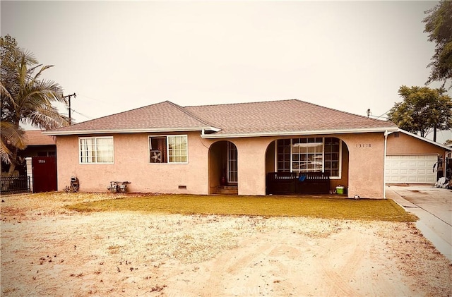 13118 Beaty Ave, Whittier, CA 90605 - view of front of home featuring covered porch, stucco siding, driveway, and an attached garage