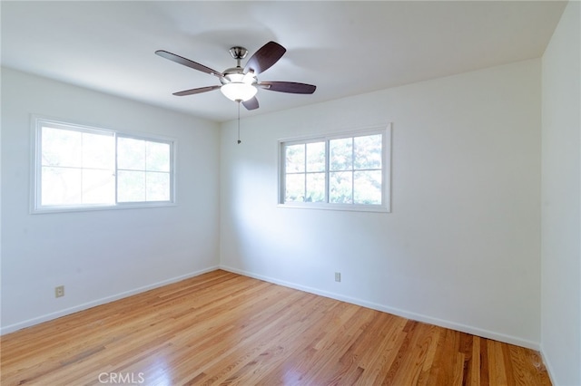 10935 Nassau Ave, Sunland, CA 91040 - unfurnished room with healthy amount of natural light, light wood-style floors, and ceiling fan